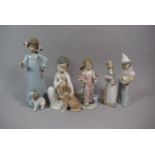 A Collection of Four Lladro Figural Ornaments of Children Together with One Nao Example