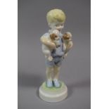 A Royal Worcester Figure of Boy with Two Puppies