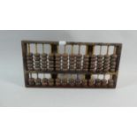 A Chinese Lotus Flower Brand Wooden Brass Mounted Abacus, 37cm Wide