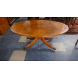 A Burr Walnut Oval Coffee Table with Crossbanded Top, 117cm Wide