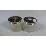 A Pair of Glass Dressing Table Pots with Silver and Tortoiseshell Lids