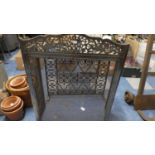 A Iron Fire Guard and a Pierced Metal Framed Triple Fire Guard