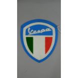 A Wall Mounting Reproduction Shield Shaped Metal Vespa Scooter Plaque, 26cm High, Plus VAT