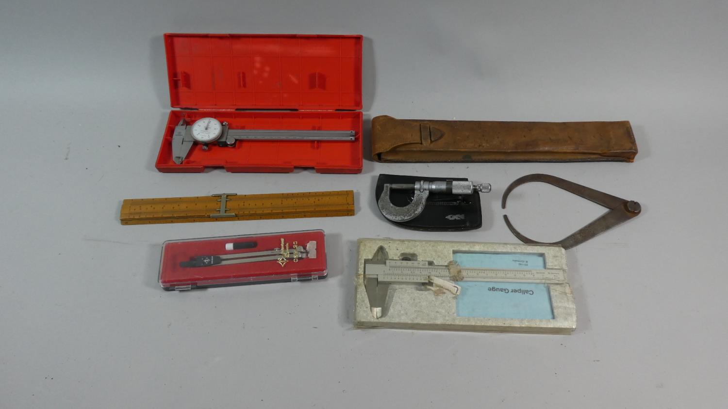 A Collection Drawing Instruments, Slide Rule, Micrometer Screw Etc