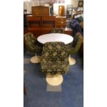 A 1970's Circular Lusch Dining Table on Cotton Reel Support Together with Four Matching Chairs