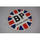 A Cast Metal Circular Wall Mounting Sign for BP Motor Spirit, 25cm Diameter