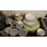 A Collection of Dinner and Teawares to Include Teacups and Saucers, Jersey Milk Jug, Dinner Plates