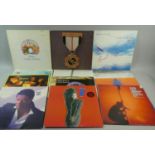 A Collection of Twelve LP Records to Include Dire Straits (Double), Paul McCartney, Queen,