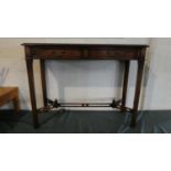 A Reproduction Mahogany Side Table with Crossbanded Top and Two Drawers on Rectangular Canted