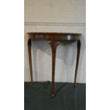 An Edwardian Walnut Demi Lune Side Table on Extending Cabriole Supports, 72cm Wide