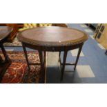 A Edwardian French Style Oval Centre Table with Tooled Leather Top and Single Drawer on Square