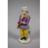 A Sitzendorf Porcelain Figure of a Turkish Musician with Flute, 14cm High