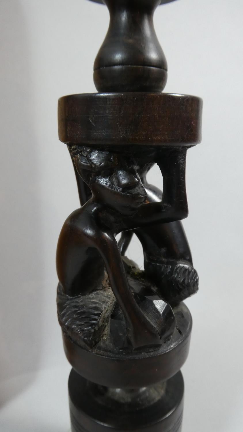 A Carved African Plaque Depicting Maidens Head Together with a Carved African Candle Stick - Image 3 of 3