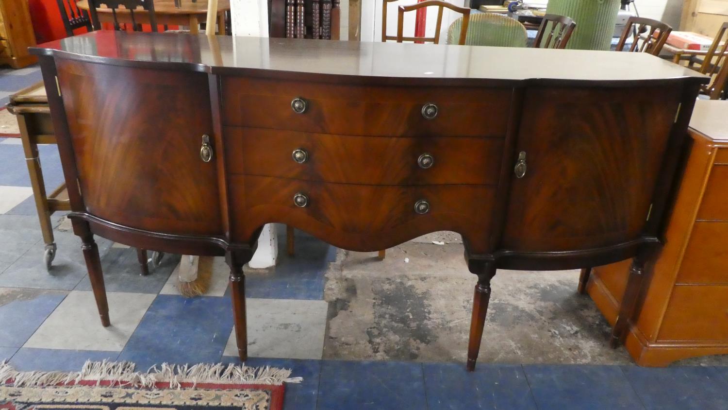 A Reproduction Mahogany Serpentine Front Sideboard Flanked by Cupboards, Crossbanded Top, 168cm Wide