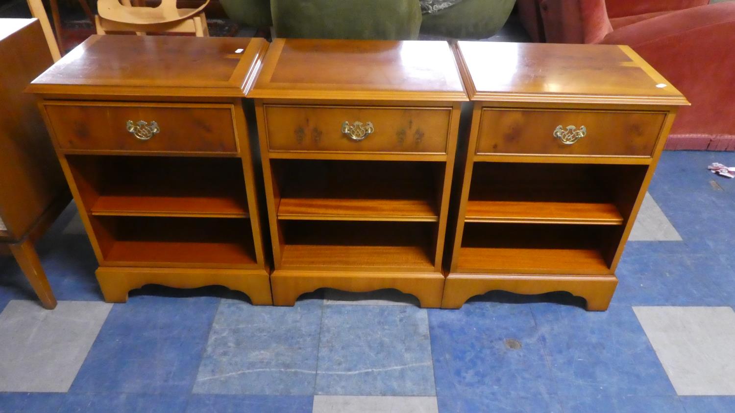 A Set of Three Crossbanded Yew Wood Bedside Cabinets with Single Top Drawers, Each 48cm Wide