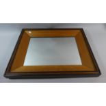 A Framed Rectangular Wall Mirror, 55cm High