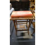 A Bamboo Occasional Table and a Vintage Monopoly Game