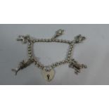 A Silver Charm Bracelet, 34.7g