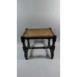 An Edwardian Oak Framed Cane Seated Rectangular Topped Stool, 41cm Wide