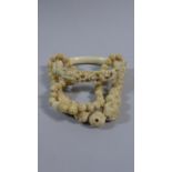 A Cantonese Carved Ivory Bangle and a Bone Bracelet