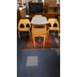 A Formica Topped Drop Leaf Kitchen Table and Four Chairs