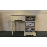 A Cream Painted Galleried Desk or Dressing Table with Three Drawers Having Decorated Panels, 90cm