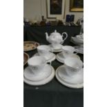 A Part Tea Set with Mercedes Motif to Include Teapot and Five Trios