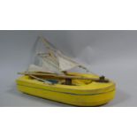 A Mid 20th Century Wooden Model of a Boat, 13.5 cm wide