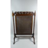 A Nice Quality Edwardian Mahogany Barley Twist and Cane Fire Screen with Carved and Pierced Top