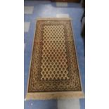 A Patterned Woollen Hearth Rug, 160cm x 80cm