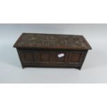 A Carved Oak Work Box with Four Panel Front in the Form of a Coffer Chest, 29cm Wide