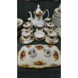 A Royal Albert Old Country Rose Coffee Set Comprising Six Cups and Saucers, Coffee Pot, Sugar and