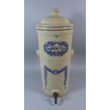 A Large Glazed Stoneware Water Filter, The Brownlow Filter with Stencilled Blue Decoration, Brass