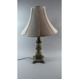 A Large Reproduction Table Lamp in the Form of Reeded Column with Acanthus and Swag Mounts on