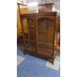 An Edwardian Walnut Display Cabinet with Two Glazed Shelves, 87cm Wide