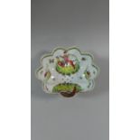 A Shaped Footed Straining Bowl of Circular Fluted form with Hand Painted Tropical Bird, Insect and