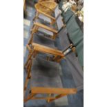 A Set of Four Folding Directors Chairs