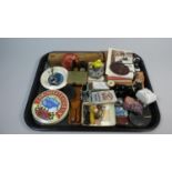 A Tray of Curios to Include Cigarette and Playing Cards, Advertising Ashtray, Pot Lid, Set of