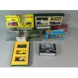 A Box of Diecast Toys to Include Two Limited Edition Corgi Omnibuses, Corgi Three Van Set, James