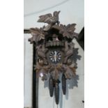 A Reproduction Black Forest Style Three Weight Cuckoo Clock
