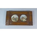 A Pair of Framed Pot Lids, War and Peace, 37cm Wide