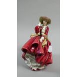 A Royal Doulton Figure, Top o' the Hill