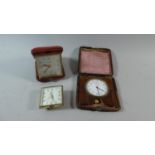 Two Travel Alarm Clocks and a Vintage Crocodile Cased Clock