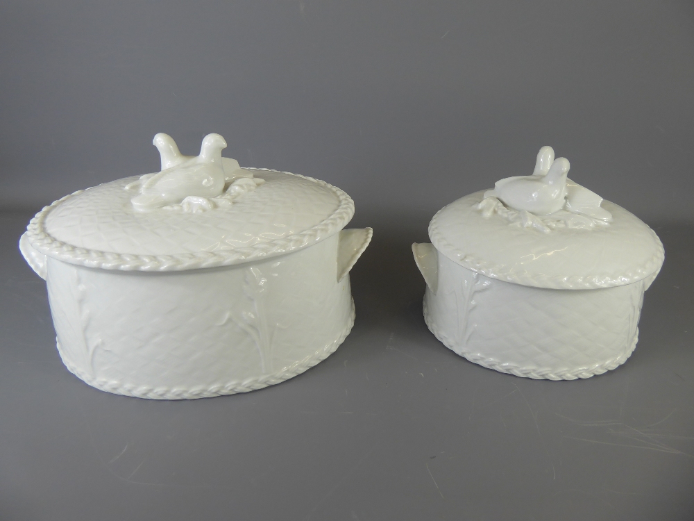 Two Royal Worcester Porcelain 'Gourmet' Tureen and Covers, one large oval and one smaller round,