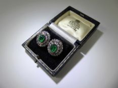 A Pair of Antique Colombian Emerald and Diamond Earrings. The vivid green emeralds of minor