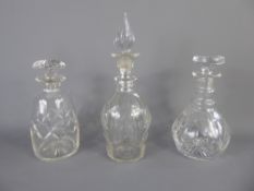 Three Vintage Cut-Glass Decanters, with stoppers.