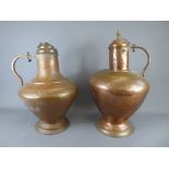 Two Antique Portuguese Copper Ewers, approx 44 cms and 55 cms respectively.