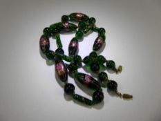 A Set of Vintage Murano Glass Beads, the beads comprising lozenge, circular and tubular pieces,