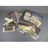 A Large Quantity of Mint UK Decimal Stamps, in presentation packs and a stockbook; f/v c.£1000.00.