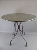 A Marble-Top Garden Table, approx 74 cms dia. x 74 cms high.